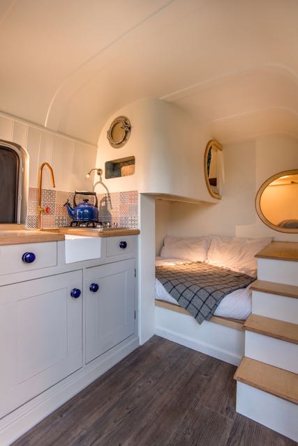 Top Bunk , Rear Bunk with storage steps and kitchen unit